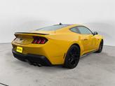 Thumbnail of 2024 Yellow Splash Metallic Tri-coat Ford Mustang
