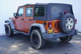 Thumbnail of 2011 Mango Tango Pearlcoat Jeep Wrangler Unlimited