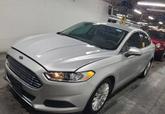 Photo of 2016 Ingot Silver Ford Fusion Hybrid