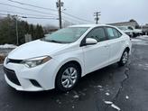 Photo of 2015 white Toyota Corolla