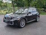 Thumbnail of 2024 Black Sapphire Metallic BMW X5 PHEV