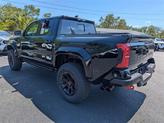 Thumbnail of 2025 Black Toyota Tacoma Hybrid