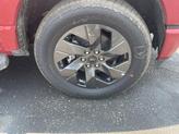Thumbnail of 2025 Rapid Red Metallic Tinted Clearcoat Ford F-150 Lightning