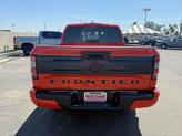 Thumbnail of 2025 Afterburn Orange Nissan Frontier