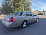Thumbnail of 2004 Tan Lincoln Town Car
