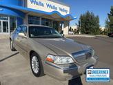 Photo of 2004 Tan Lincoln Town Car