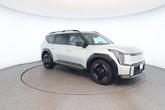 Thumbnail of 2024 Ivory Silver Matte Kia EV9