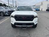 Thumbnail of 2024 Glacier White Nissan Frontier
