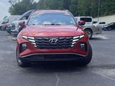 Thumbnail of 2023 Calypso Red Hyundai TUCSON