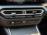 Thumbnail of 2024 Mineral White Metallic BMW 330e