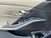 Thumbnail of 2024 Mineral White Metallic BMW 330e