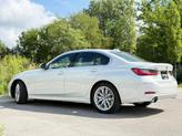 Thumbnail of 2024 Mineral White Metallic BMW 330e