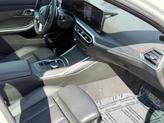 Thumbnail of 2024 Mineral White Metallic BMW 330e