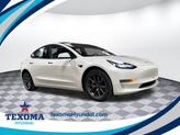 Photo of 2023 White Tesla Model 3