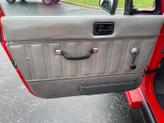 Thumbnail of 1989 Red Jeep Wrangler