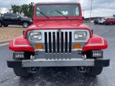Thumbnail of 1989 Red Jeep Wrangler