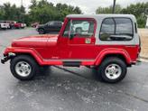 Thumbnail of 1989 Red Jeep Wrangler