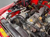 Thumbnail of 1989 Red Jeep Wrangler