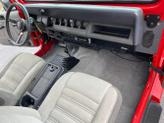 Thumbnail of 1989 Red Jeep Wrangler