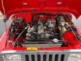 Thumbnail of 1989 Red Jeep Wrangler