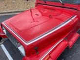Thumbnail of 1989 Red Jeep Wrangler