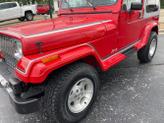 Thumbnail of 1989 Red Jeep Wrangler
