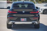 Thumbnail of 2025 Black Sapphire Metallic BMW X4