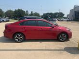 Thumbnail of 2021 Currant Red Kia Forte