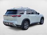 Thumbnail of 2024 Pearl White Tricoat Nissan Pathfinder