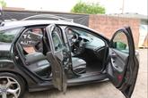 Thumbnail of 2014 Tuxedo Black Ford Focus ST