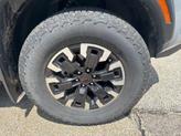 Thumbnail of 2024 Boulder Gray Pearl Nissan Frontier