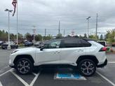 Thumbnail of 2025 Wind Chill Pearl/Midnight Black Metallic Toyota RAV4 Hybrid