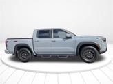 Thumbnail of 2023 Boulder Gray Pearl Nissan Frontier