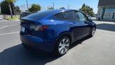 Thumbnail of 2023 Deep Blue Metallic Tesla Model Y