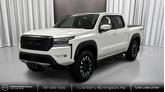 Photo of 2023 Glacier White Nissan Frontier