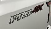 Thumbnail of 2023 Glacier White Nissan Frontier