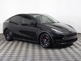 Thumbnail of 2022 Solid Black Tesla Model Y