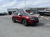 Photo of 2026 Scarlet Ember Tintcoat Nissan Rogue