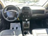 Thumbnail of 2010 Sunburst Orange Pearlcoat Jeep Compass