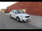 Photo of 2009 White Water Suzuki SX4