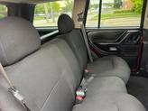Thumbnail of 2004 Red Jeep Grand Cherokee