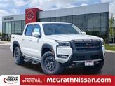 Photo of 2025 Glacier White Nissan Frontier