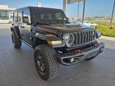 Thumbnail of 2024 Black Clearcoat Jeep Wrangler