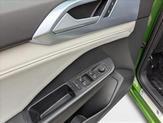 Thumbnail of 2025 Bright Moss Green Metallic Volkswagen Taos