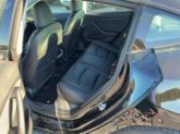 Thumbnail of 2022 Solid Black Tesla Model 3