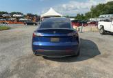 Thumbnail of 2023 Deep Blue Metallic Tesla Model Y
