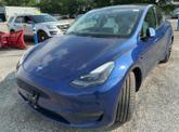 Thumbnail of 2023 Deep Blue Metallic Tesla Model Y