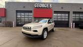 Photo of 2014 Beige Jeep Cherokee