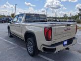 Thumbnail of 2023 Desert Sand Metallic GMC Sierra 1500
