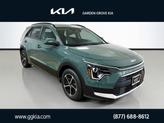 Photo of 2025 Cityscape Green Kia Niro Plug-In Hybrid